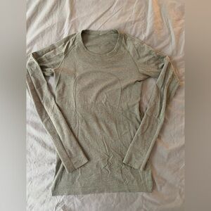 Lululemon long sleeve shirt in olive green. Size 4.